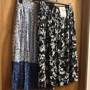 2 NWT Floral Black and White and Blue and white skirts.
